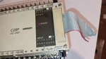 Omron C28P-EDR-A Programmable Control, Corner Mounts Broken, Powers Up!. Fixed Price $99.00.