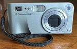 Hp Photosmart M415 Compact 5.2MP 3X Optical Zoom Point & Shoot Digital Camera. Fixed Price $66.00.