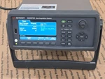 Keysight DAQ973A Data Acquisition System Plus One DAQM903A Module. Fixed Price $1190.00.