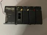 Automationdirect 205 D2-04BDC-1 12/24VDC Slot Base Rack. Fixed Price $79.00.