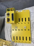 Fanuc Base Unit A03B-0807-C004 With Module Type A03B-0807-C011. Fixed Price $150.00.