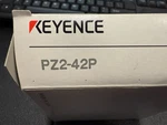 One New Keyence PZ2-42 Photoelectric Sensor Switch Free Shipping Usps. Fixed Price $60.00.